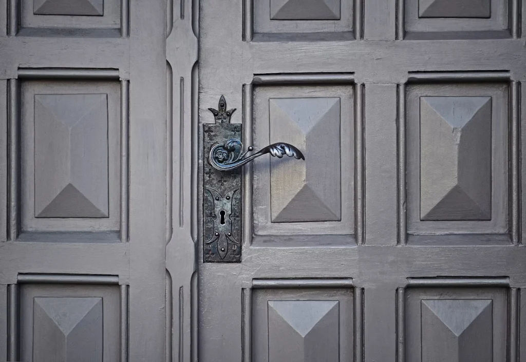 huge black door with black door knob Security Deposit Refunds