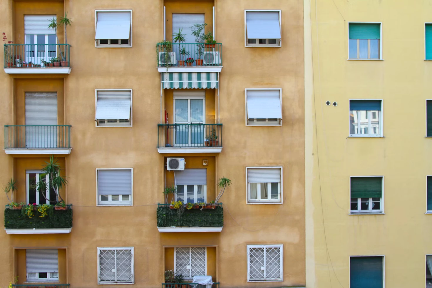 building view of small windows and terraces High Turnover Rates